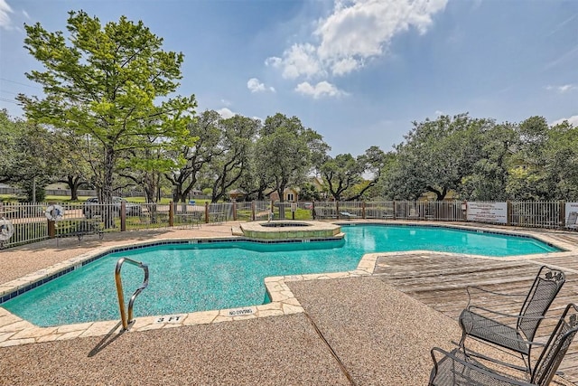 11901 Swearingen Dr Unit 30, Austin, TX 78758 - community pool with a patio area and a hot tub