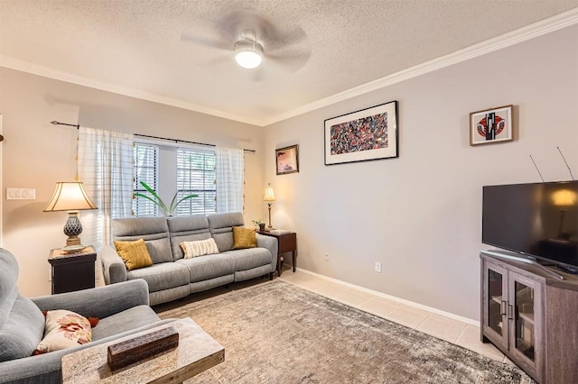 11901 Swearingen Dr Unit 30, Austin, TX 78758 - living room featuring ceiling fan, ornamental molding, a textured ceiling, and tile patterned flooring