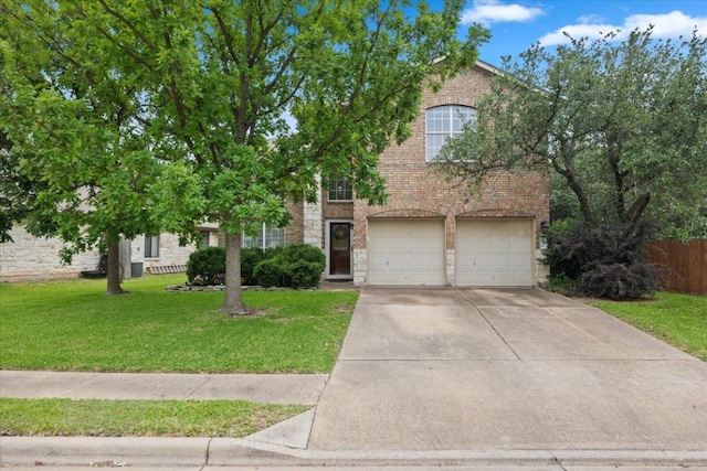 2502 Nightshade Dr, Cedar Park, TX 78613 - view of front of property with concrete driveway, a garage, and brick siding
