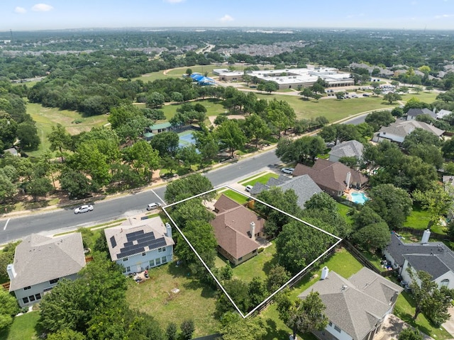 aerial view of residential area featuring property boundaries highlighted