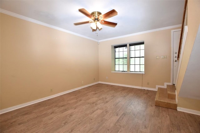 11404 Walnut Ridge Dr Unit 14, Austin, TX 78753 - unfurnished room featuring a ceiling fan, light wood-type flooring, crown molding, and baseboards
