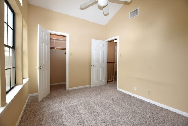11404 Walnut Ridge Dr Unit 14, Austin, TX 78753 - unfurnished bedroom with vaulted ceiling, carpet flooring, a spacious closet, a closet, and ceiling fan