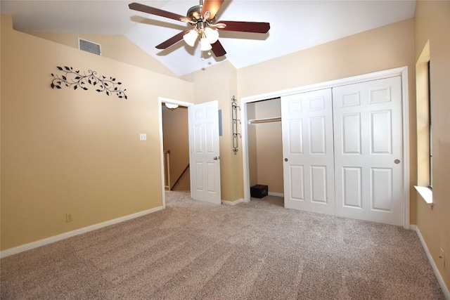 11404 Walnut Ridge Dr Unit 14, Austin, TX 78753 - unfurnished bedroom with carpet flooring, lofted ceiling, a closet, and baseboards