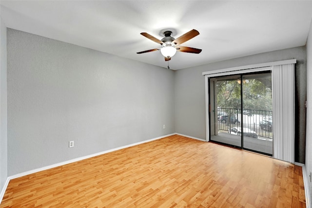 1202 Thorpe Ln Unit 508, San Marcos, TX 78666 - empty room featuring wood finished floors, baseboards, and ceiling fan