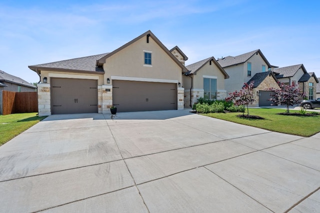 1437 Argyll Park, Bulverde, TX 78163 - view of front of house featuring stone siding, stucco siding, driveway, and an attached garage