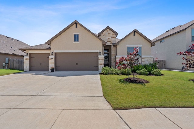 1437 Argyll Park, Bulverde, TX 78163 - view of front facade with stone siding, stucco siding, driveway, and an attached garage