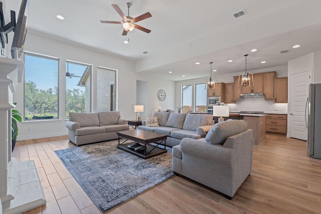 1437 Argyll Park, Bulverde, TX 78163 - living room featuring light wood-type flooring, ceiling fan, recessed lighting, and baseboards