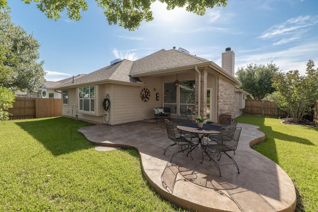765 Bent Wood Pl, Round Rock, TX 78665 - back of property with ceiling fan, a chimney, a patio area, and brick siding