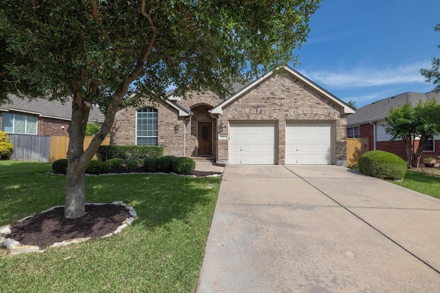 765 Bent Wood Pl, Round Rock, TX 78665 - view of front of property with brick siding, a garage, and concrete driveway