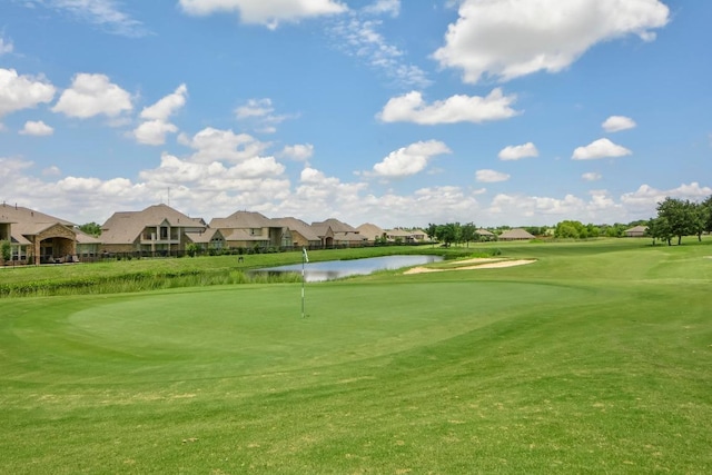 765 Bent Wood Pl, Round Rock, TX 78665 - view of home's community featuring a water view, view of golf course, a residential view, and a lawn