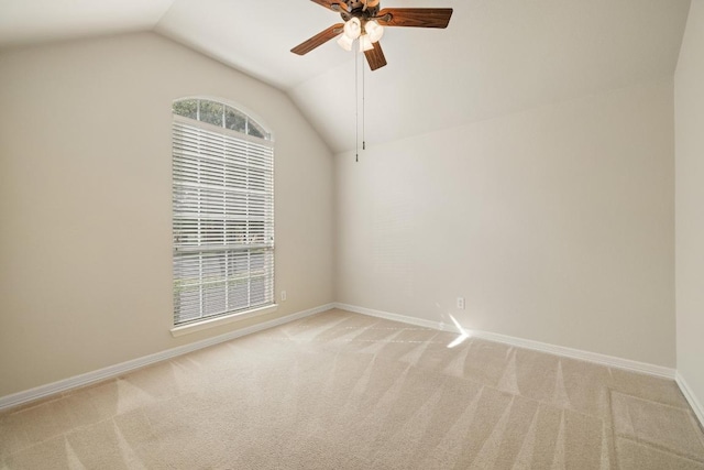 765 Bent Wood Pl, Round Rock, TX 78665 - spare room with vaulted ceiling, light colored carpet, ceiling fan, and baseboards