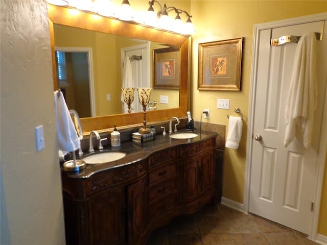4003 Wyman Cv, Round Rock, TX 78681 - full bath with double vanity and tile patterned floors