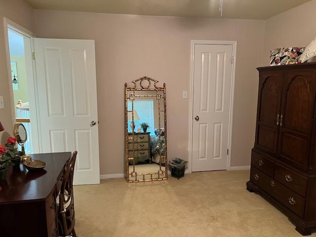 4003 Wyman Cv, Round Rock, TX 78681 - bedroom featuring light carpet and baseboards