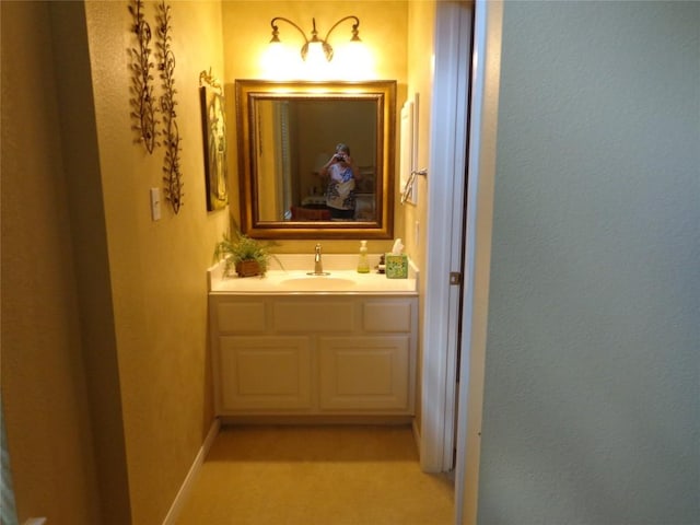 4003 Wyman Cv, Round Rock, TX 78681 - hall featuring a sink, light carpet, and baseboards