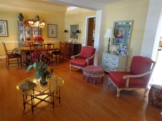 4003 Wyman Cv, Round Rock, TX 78681 - living area featuring wood finished floors and a chandelier