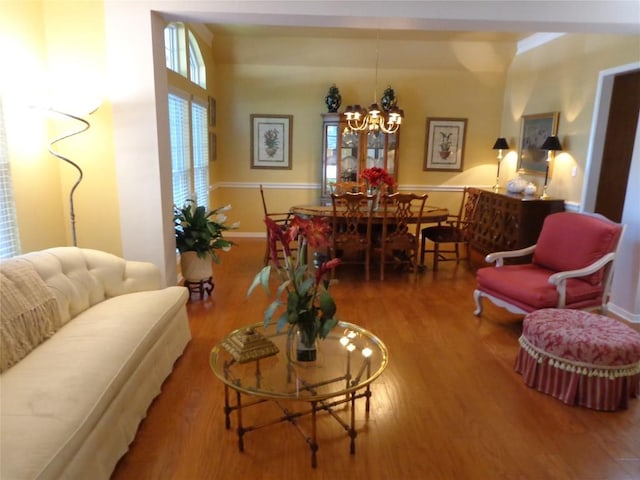 4003 Wyman Cv, Round Rock, TX 78681 - living area featuring wood finished floors and a chandelier
