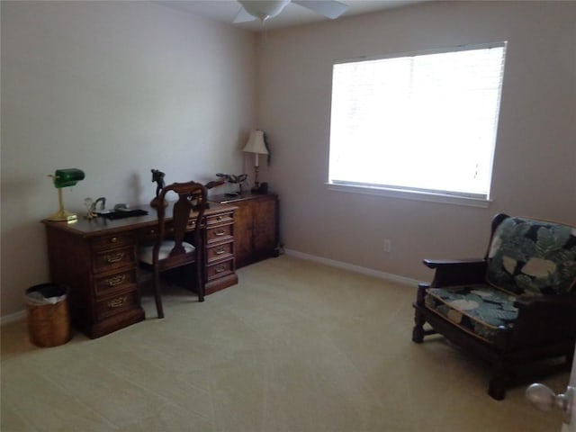 4003 Wyman Cv, Round Rock, TX 78681 - home office with light carpet, a ceiling fan, and baseboards