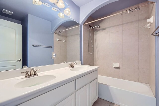 205 Sebastians Run, Austin, TX 78738 - bathroom featuring bathtub / shower combination, double vanity, and tile patterned flooring