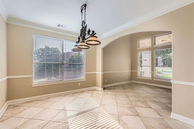 205 Sebastians Run, Austin, TX 78738 - unfurnished dining area featuring ornamental molding, tile patterned flooring, arched walkways, and a chandelier