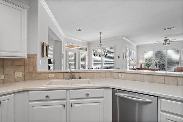 259 Red Poppy Trl, Georgetown, TX 78633 - kitchen with dishwasher, a sink, crown molding, white cabinets, and a chandelier