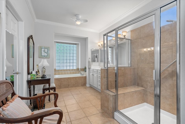 259 Red Poppy Trl, Georgetown, TX 78633 - full bathroom featuring a shower stall, a garden tub, vanity, tile patterned floors, and crown molding