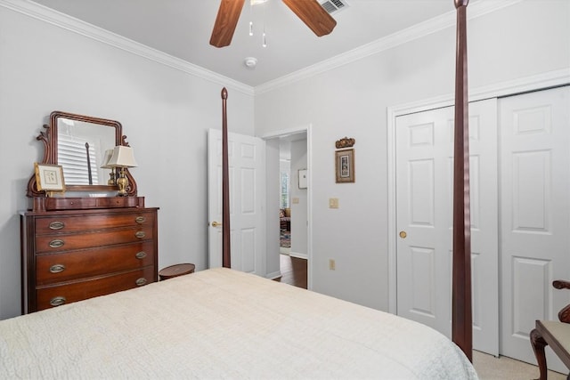 259 Red Poppy Trl, Georgetown, TX 78633 - bedroom with ornamental molding, a ceiling fan, a closet, and multiple windows