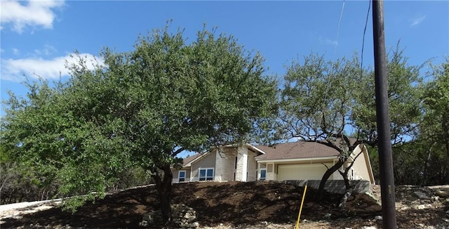 20601 Branding Iron, Lago Vista, TX 78645 - view of side of home with a garage