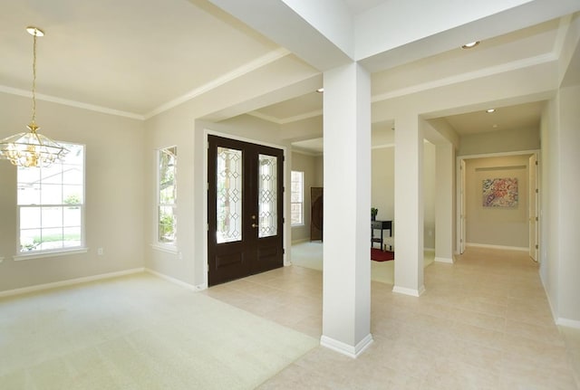 115 Blazing Star Dr, Georgetown, TX 78633 - entrance foyer featuring a chandelier, light tile patterned floors, baseboards, and crown molding