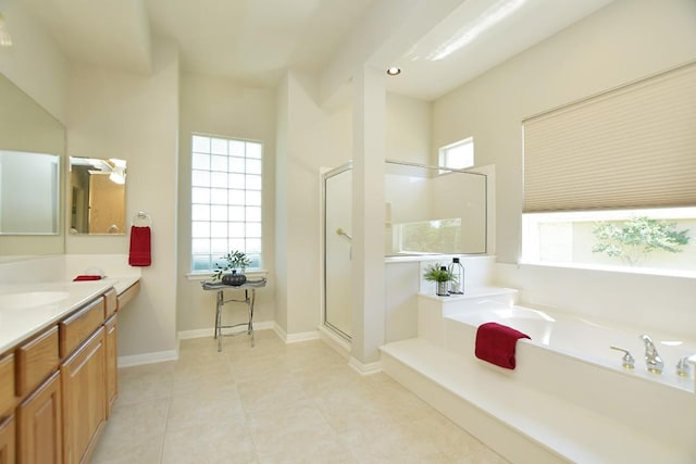 115 Blazing Star Dr, Georgetown, TX 78633 - bathroom featuring healthy amount of natural light, a shower stall, a garden tub, and vanity