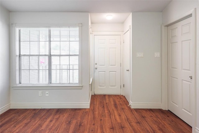 16213 Malden Dr, Pflugerville, TX 78660 - entrance foyer with baseboards and dark wood-style floors