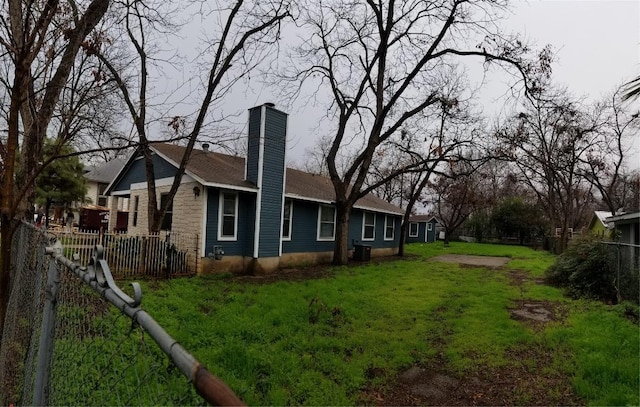 view of home's exterior with a chimney