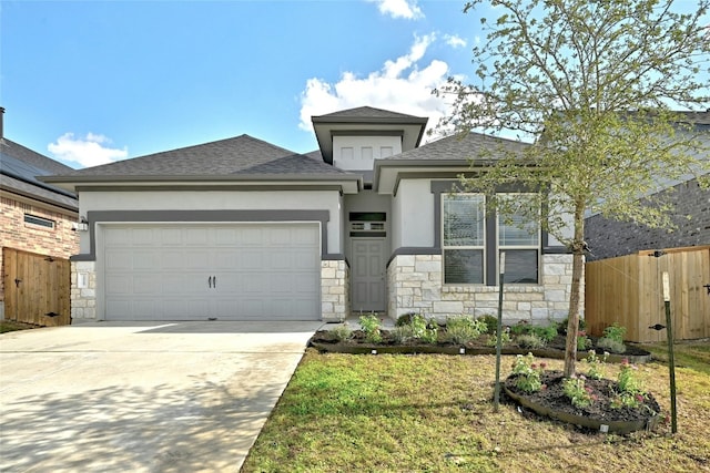 12725 Bloomington Dr Unit 129, Austin, TX 78748 - view of front of house featuring stone siding, stucco siding, and an attached garage