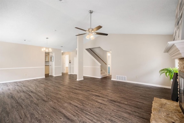 7503 Islander Dr, Austin, TX 78749 - unfurnished living room with a fireplace with raised hearth, dark wood-style flooring, lofted ceiling, stairway, and baseboards