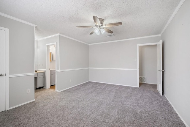 7503 Islander Dr, Austin, TX 78749 - unfurnished bedroom featuring carpet, a textured ceiling, crown molding, baseboards, and a ceiling fan