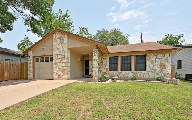 5406 Fence Row, Austin, TX 78744 - view of front facade featuring stone siding, an attached garage, concrete driveway, central AC, and roof with shingles