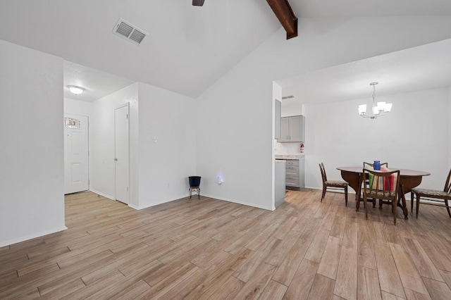 5406 Fence Row, Austin, TX 78744 - living room with light wood finished floors, a chandelier, baseboards, and a ceiling fan