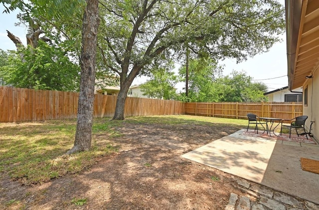 5406 Fence Row, Austin, TX 78744 - view of yard featuring a patio