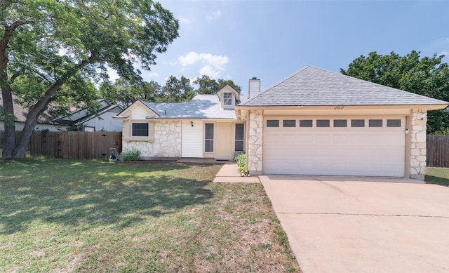 12602 Pluto Ln, Austin, TX 78727 - view of front of property featuring stone siding, a garage, driveway, a chimney, and a shingled roof