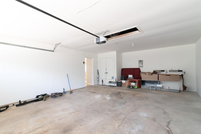 12602 Pluto Ln, Austin, TX 78727 - garage featuring a garage door opener