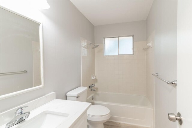 12602 Pluto Ln, Austin, TX 78727 - full bathroom featuring vanity and  shower combination