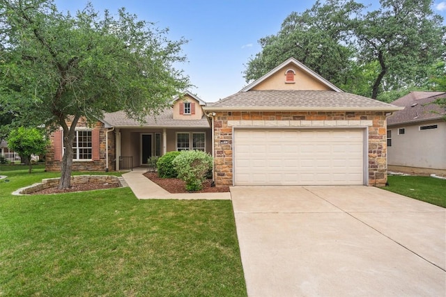 106 Ranch House Cv, Georgetown, TX 78633 - view of front of home featuring stone siding, driveway, an attached garage, a front lawn, and roof with shingles