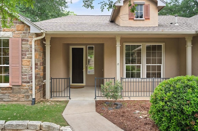106 Ranch House Cv, Georgetown, TX 78633 - doorway to property with stone siding, covered porch, a shingled roof, and stucco siding