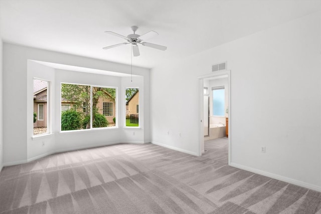 106 Ranch House Cv, Georgetown, TX 78633 - empty room featuring carpet floors, a ceiling fan, and baseboards