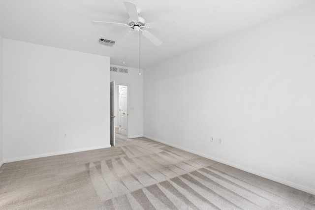 106 Ranch House Cv, Georgetown, TX 78633 - empty room with light colored carpet, a ceiling fan, and baseboards