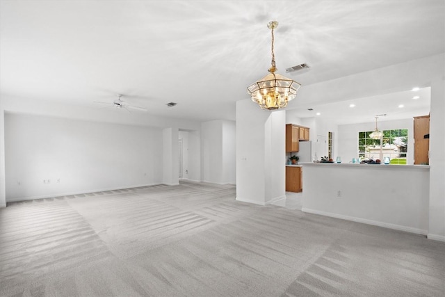 106 Ranch House Cv, Georgetown, TX 78633 - unfurnished living room featuring recessed lighting, a chandelier, light colored carpet, baseboards, and a ceiling fan