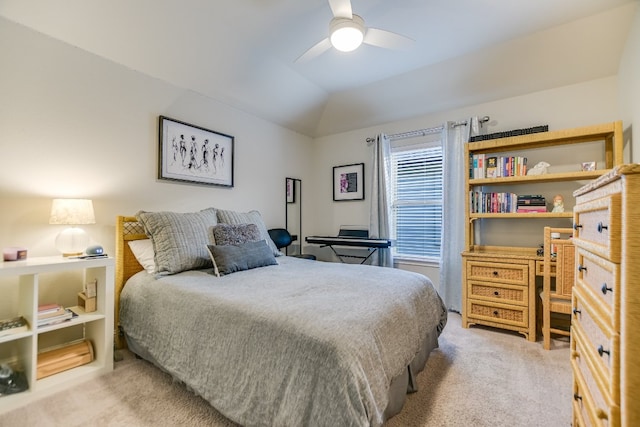 bedroom featuring carpet flooring, a ceiling fan, and lofted ceiling