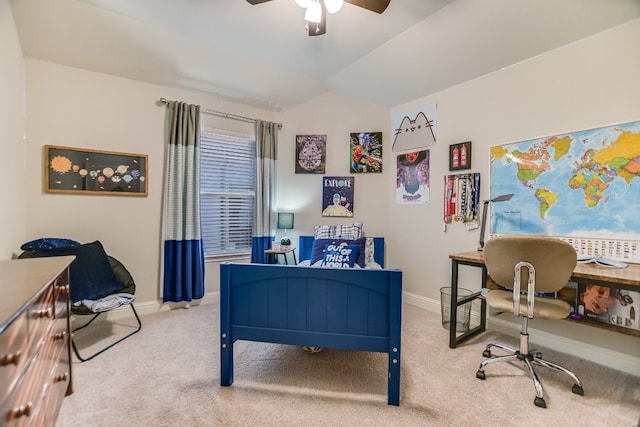 bedroom featuring carpet flooring, baseboards, vaulted ceiling, an office area, and ceiling fan