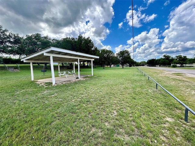 1127 Greenhill Dr, Canyon Lake, TX 78133 - view of property's community with a lawn