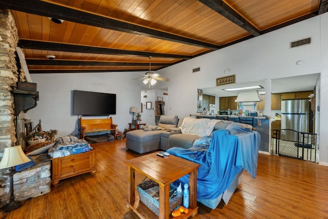 401 Patriot Way, Georgetown, TX 78626 - living room with ceiling fan, beamed ceiling, wooden ceiling, and hardwood / wood-style flooring