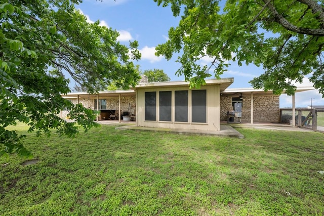 401 Patriot Way, Georgetown, TX 78626 - rear view of house featuring a patio area, a yard, ceiling fan, and stone siding